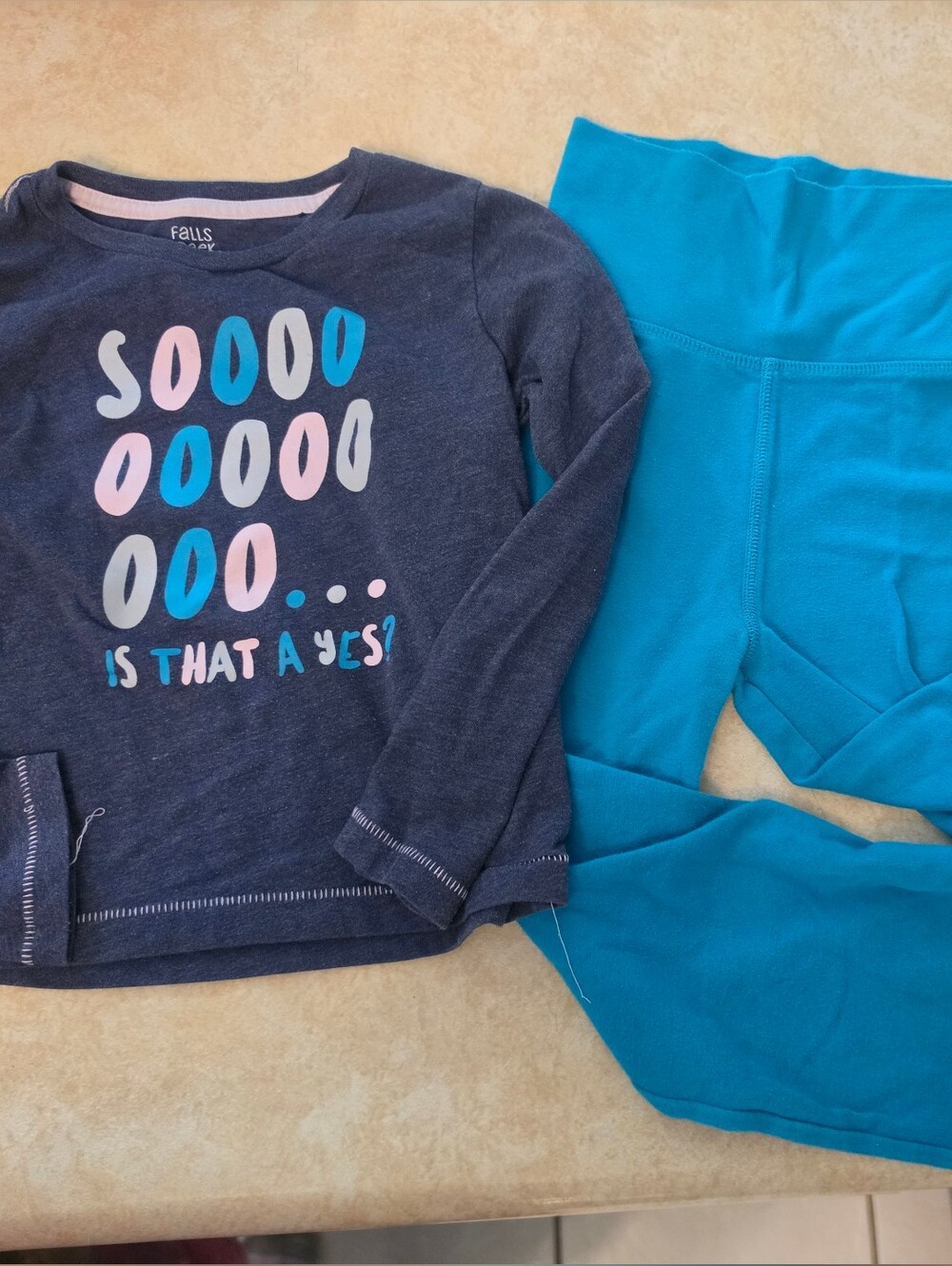 Graphic Top with Bright Teal Leggings